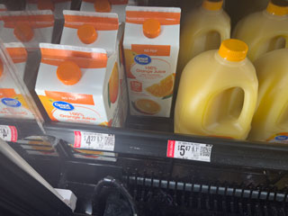 orange juice refrigerated on a rollback sale.